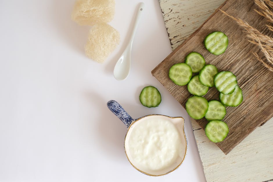 Natural ingredients for dark circle remedies including cucumber and tea